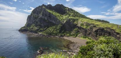 Rocky peninsula and cove on Jeju Island