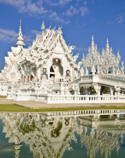 White Temple in Chiang Rai with reflections in pond