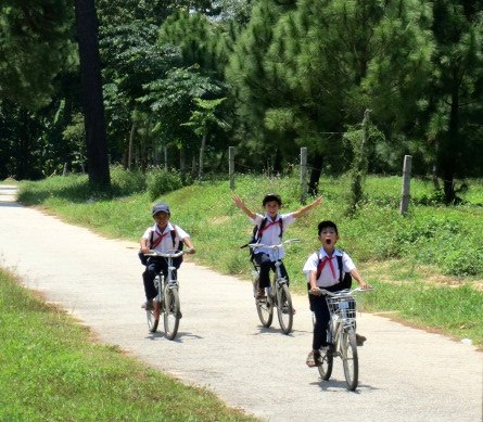 Children cycling in Vietnam