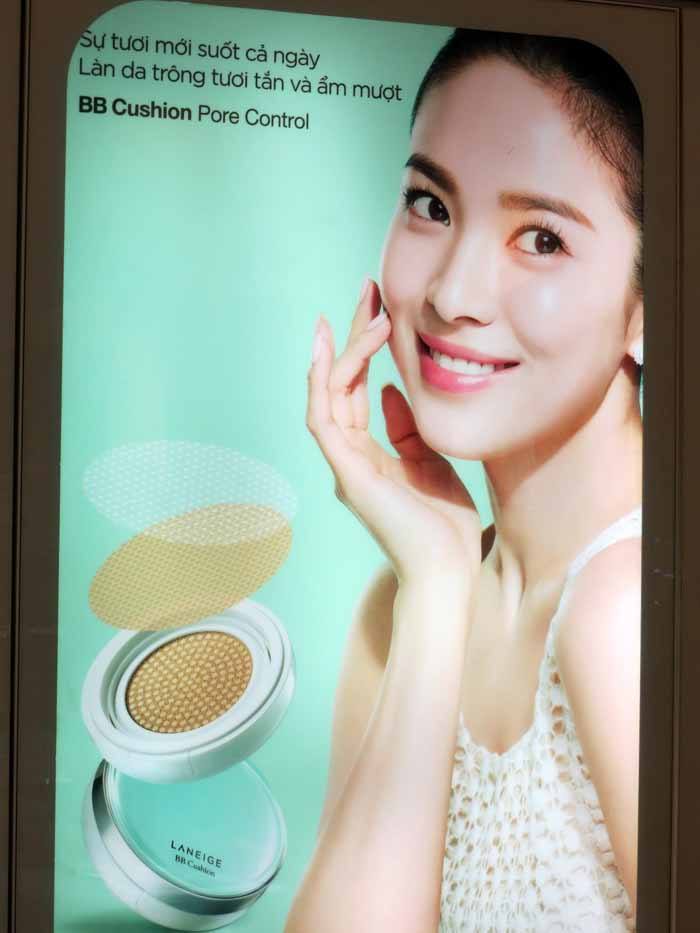 A billboard touting a pale complexion