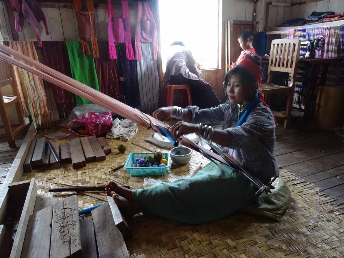 A Kayan woman weaving at Inle Lake, Shan State