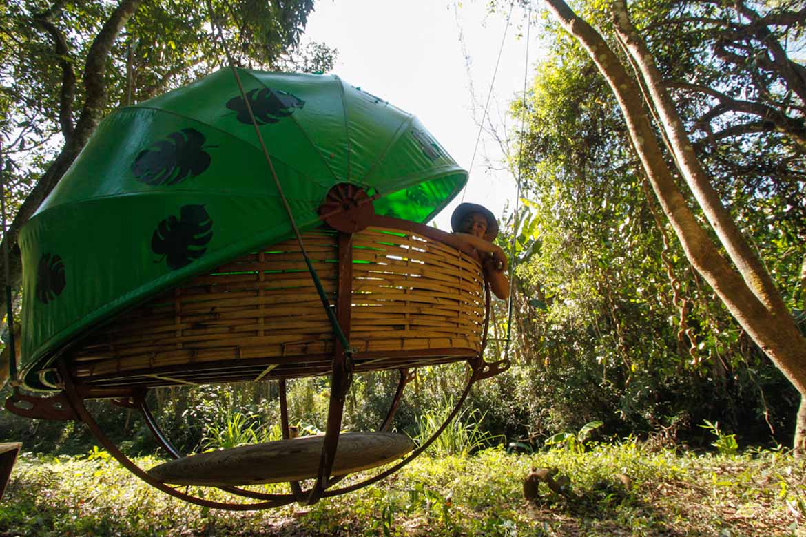 Sleep in a "nest" on an overnight hike in Laos