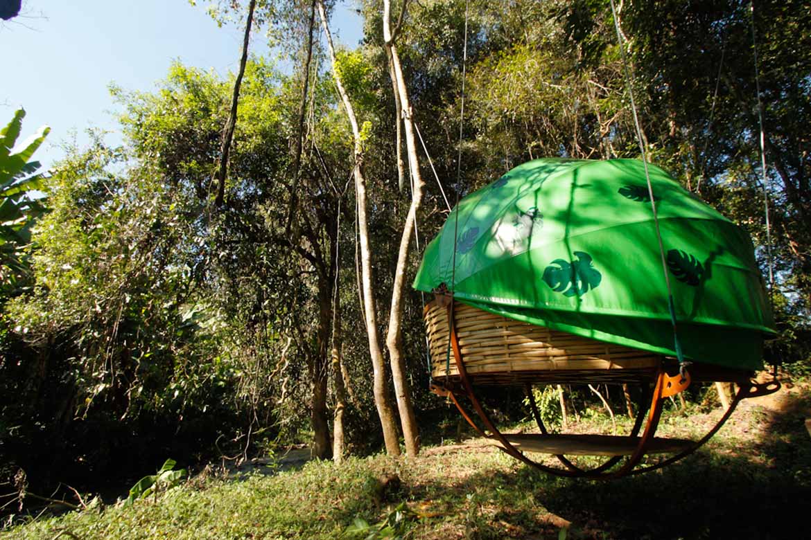 Sleep in a hanging nest in northern Laos