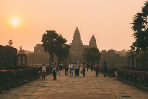 People arrive for sunrise over Angkor Wat