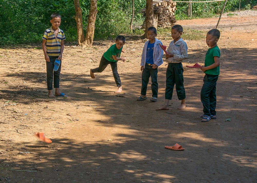 Travel photography competition - Hmong boys playing slipper