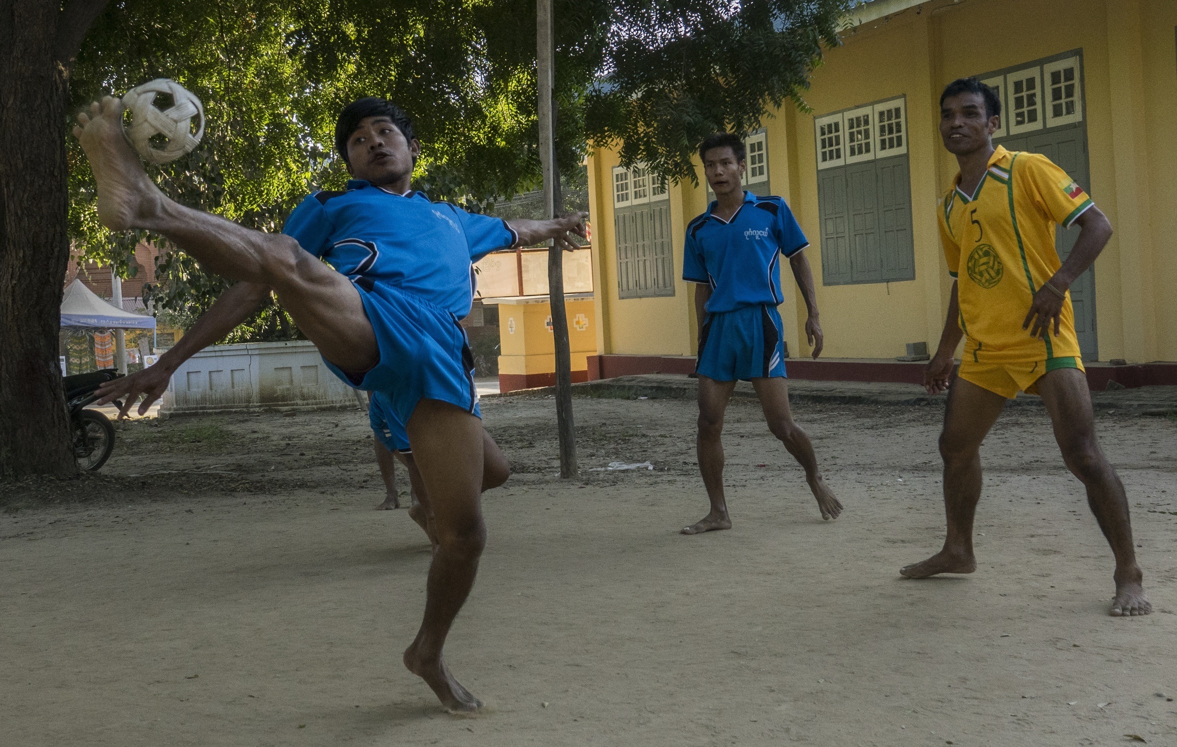 Men playing chinlone in Burma