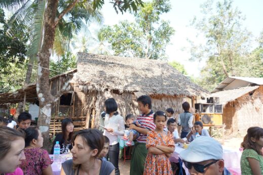 Villagers on Ogre Island, Burma (Myanmar) gathering for a birthday party