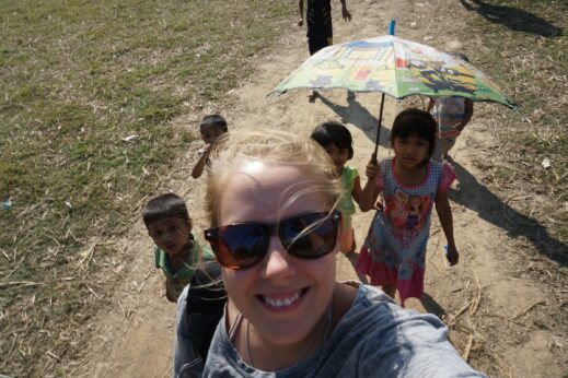 Becky with little children in Burma (Myanmar)