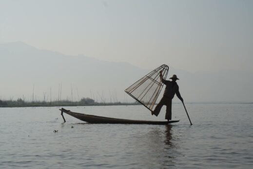 Fisherman on Inle Lake, Burma (Myanmar) rowing on one leg