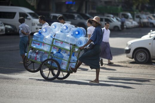 Man carrying water in Yangon