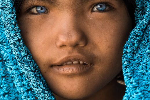 cham vietnam girl with blue eyes headscarf