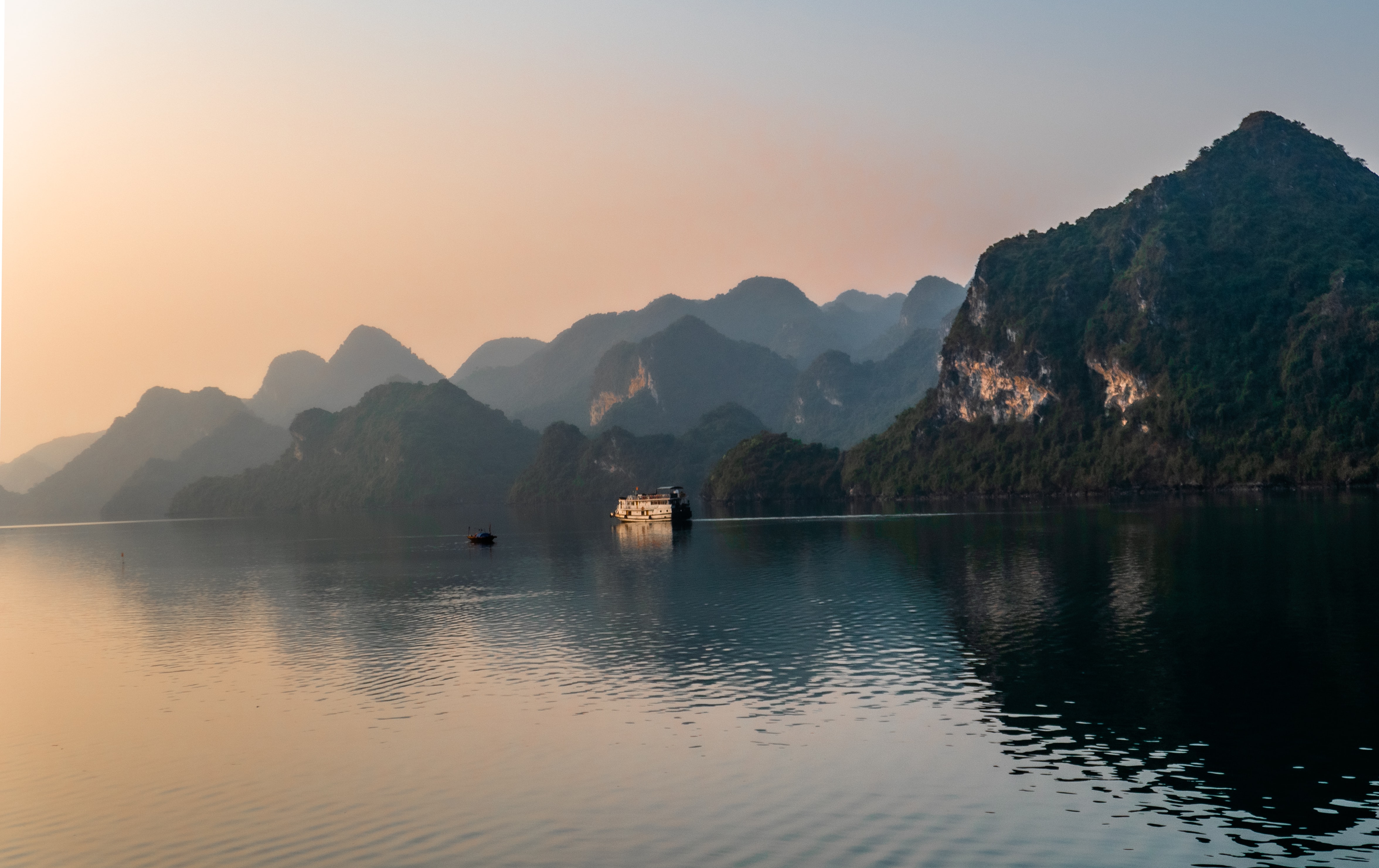 PLACE PAGE Ha Long Bay Vietnam unsplash.jpg Sunset in Halong Bay