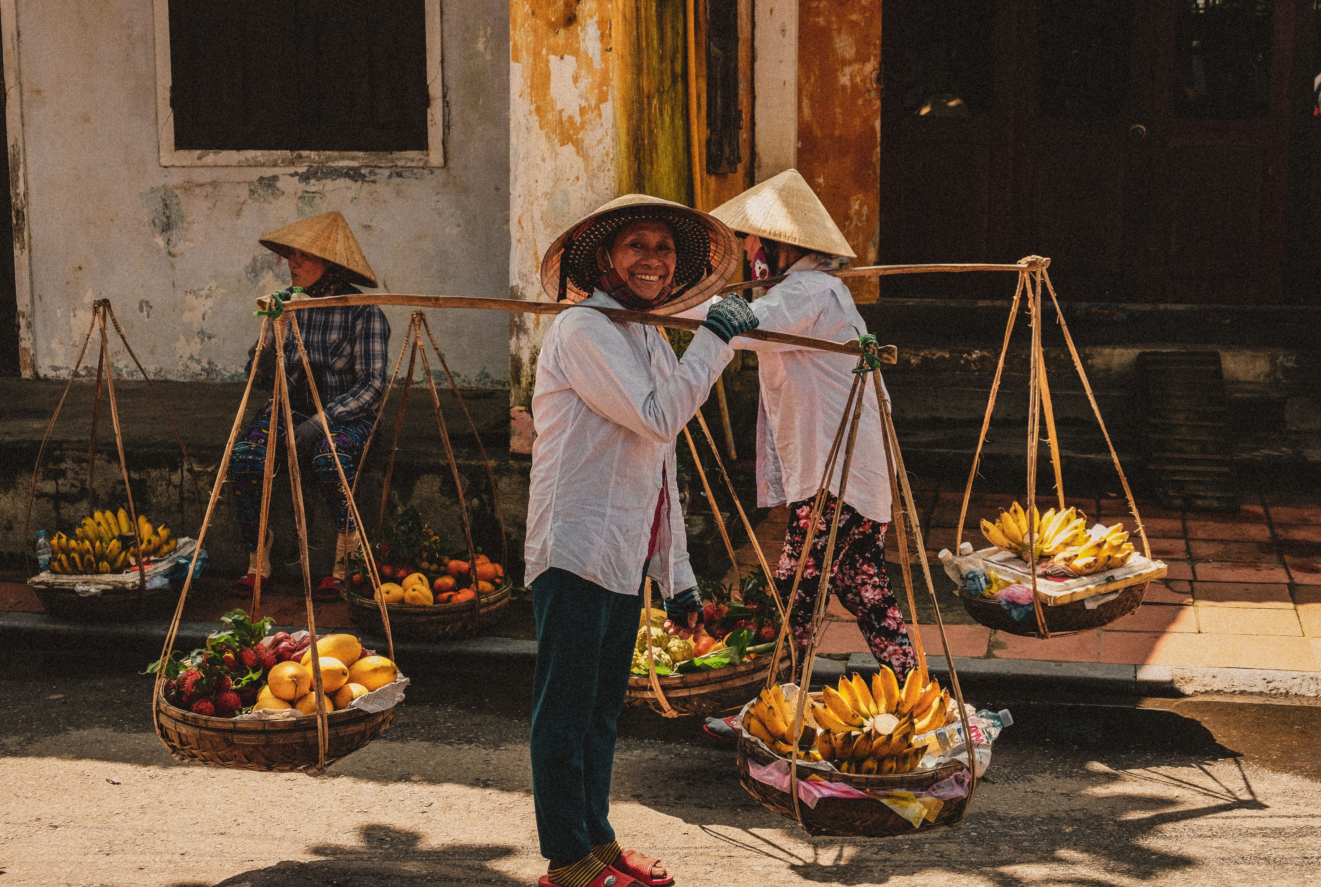 Women carrying bananas in Vietnam