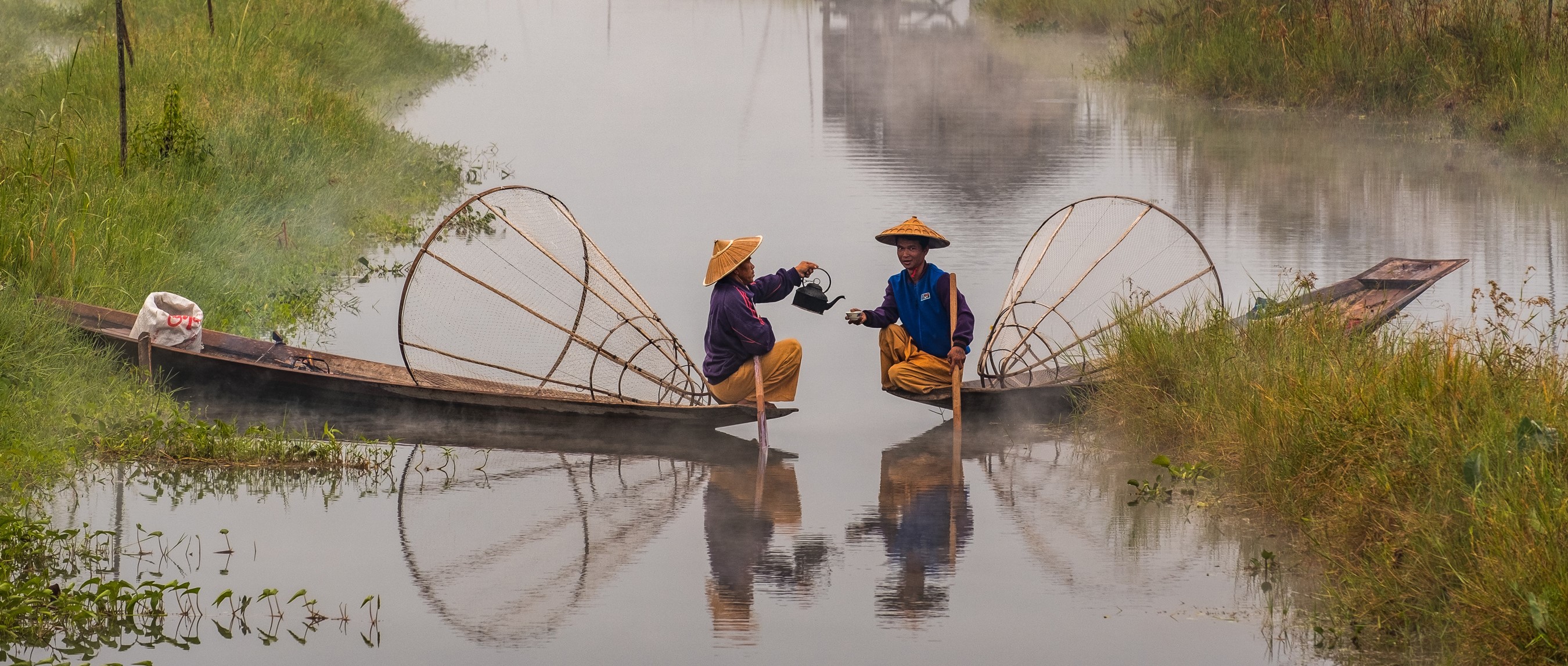 OVERVIEW-PAGE-HERO-crop-unsplash.jpg Fishermen on Inle Lake