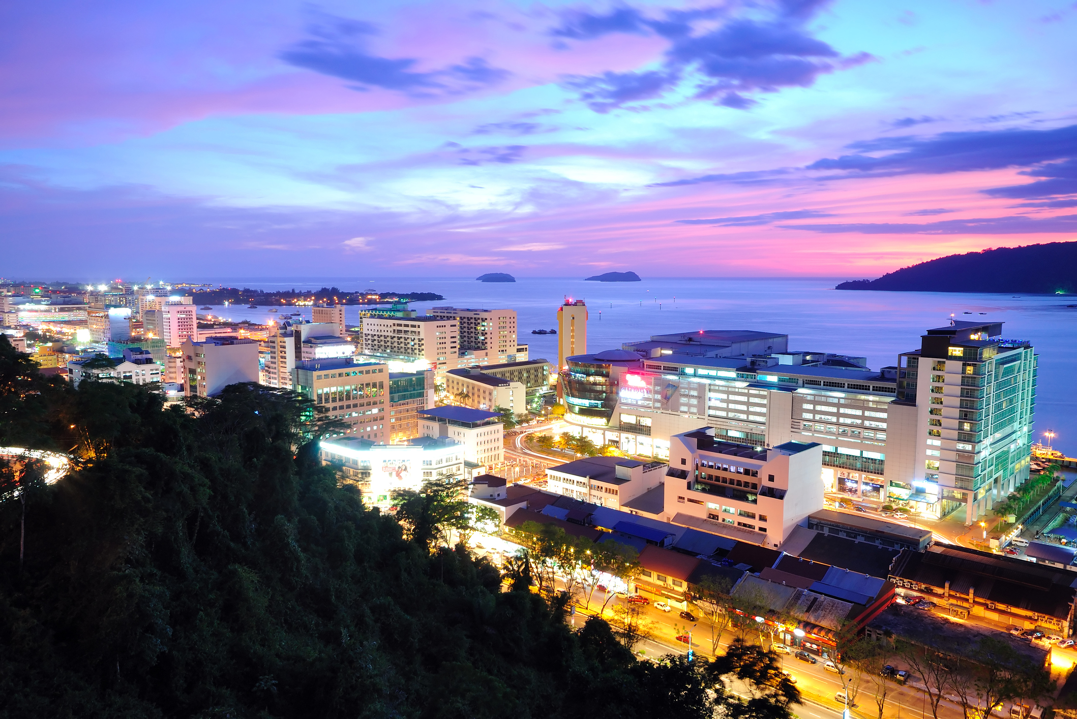 PLACE PAGE Kinabalu_iStock-472576970©Cn0ra .jpg Kota Kinabalu cityscape at sunset