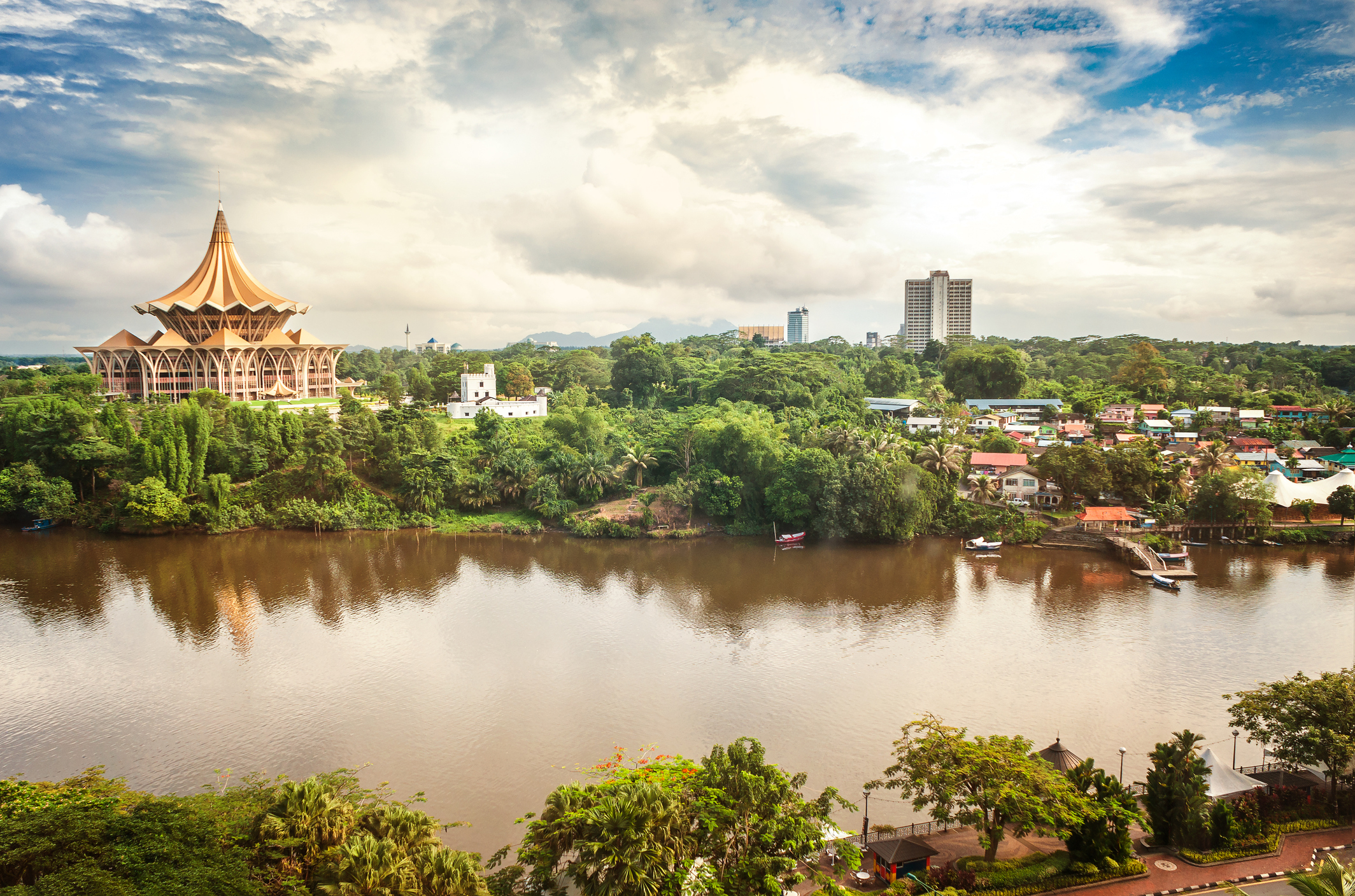 Kuching_Parliament_River_Aerial_View_NaLha.jpg Aerial view of Kuching, with the new parliament house and other buildings strewn along the river and lined with jungle.