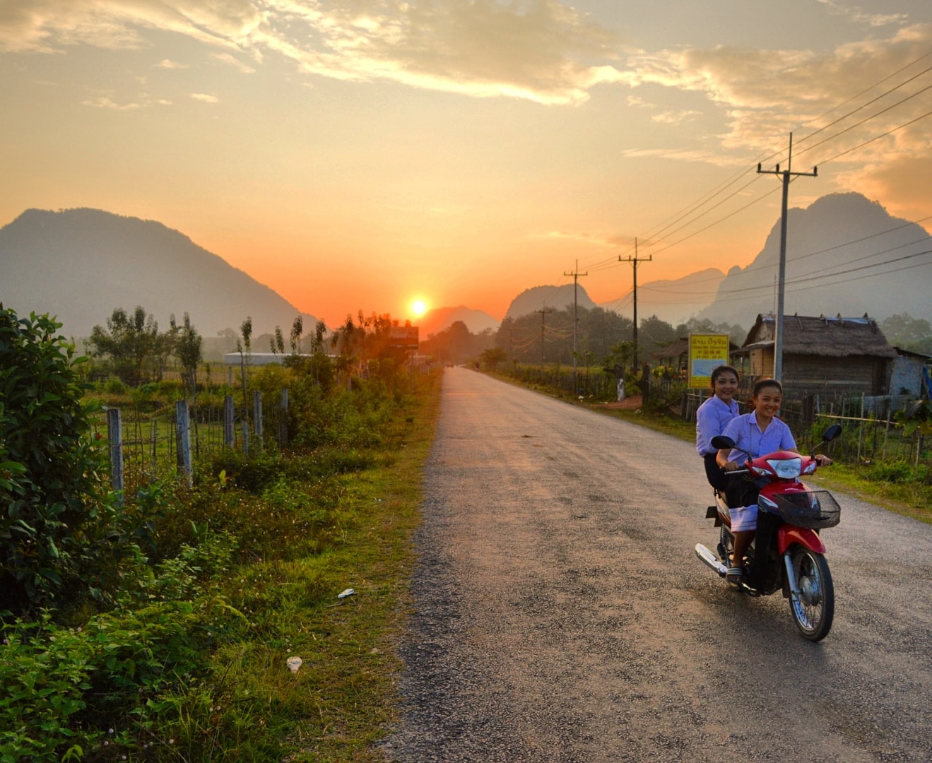 Vang Vieng - motorbike girls - Aaron.jpg Girls on motorbike