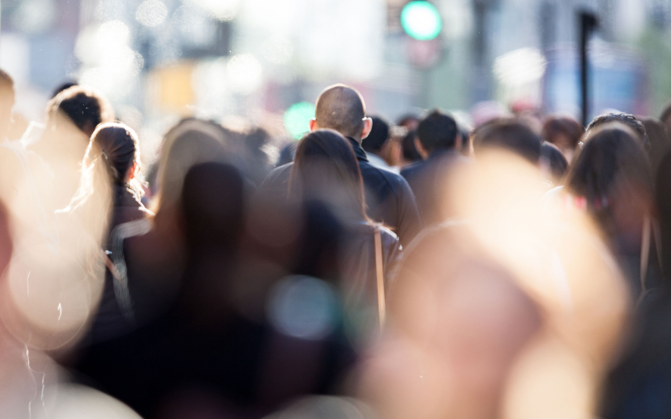 Blurred-crowd-on-street-2190x1369.jpg Blurred picture of a crowd of people