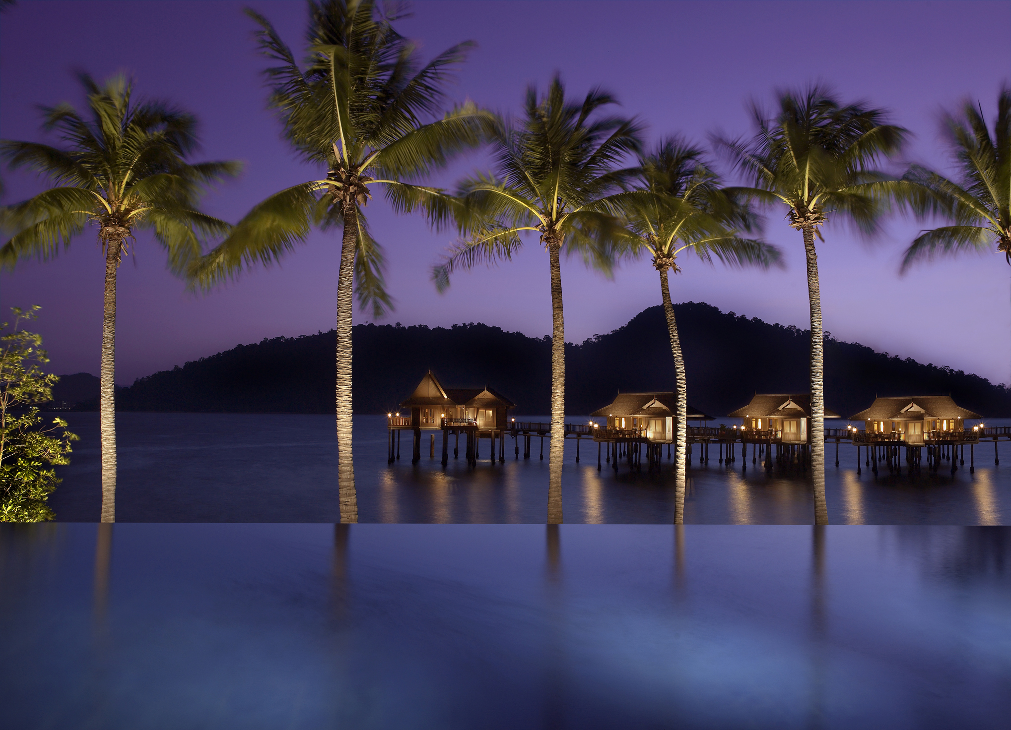 Pangkor Laut_iStock-1098238262_RAVINDRAN JOHN SMITH.jpg Palm trees at Pangkor Laut resort