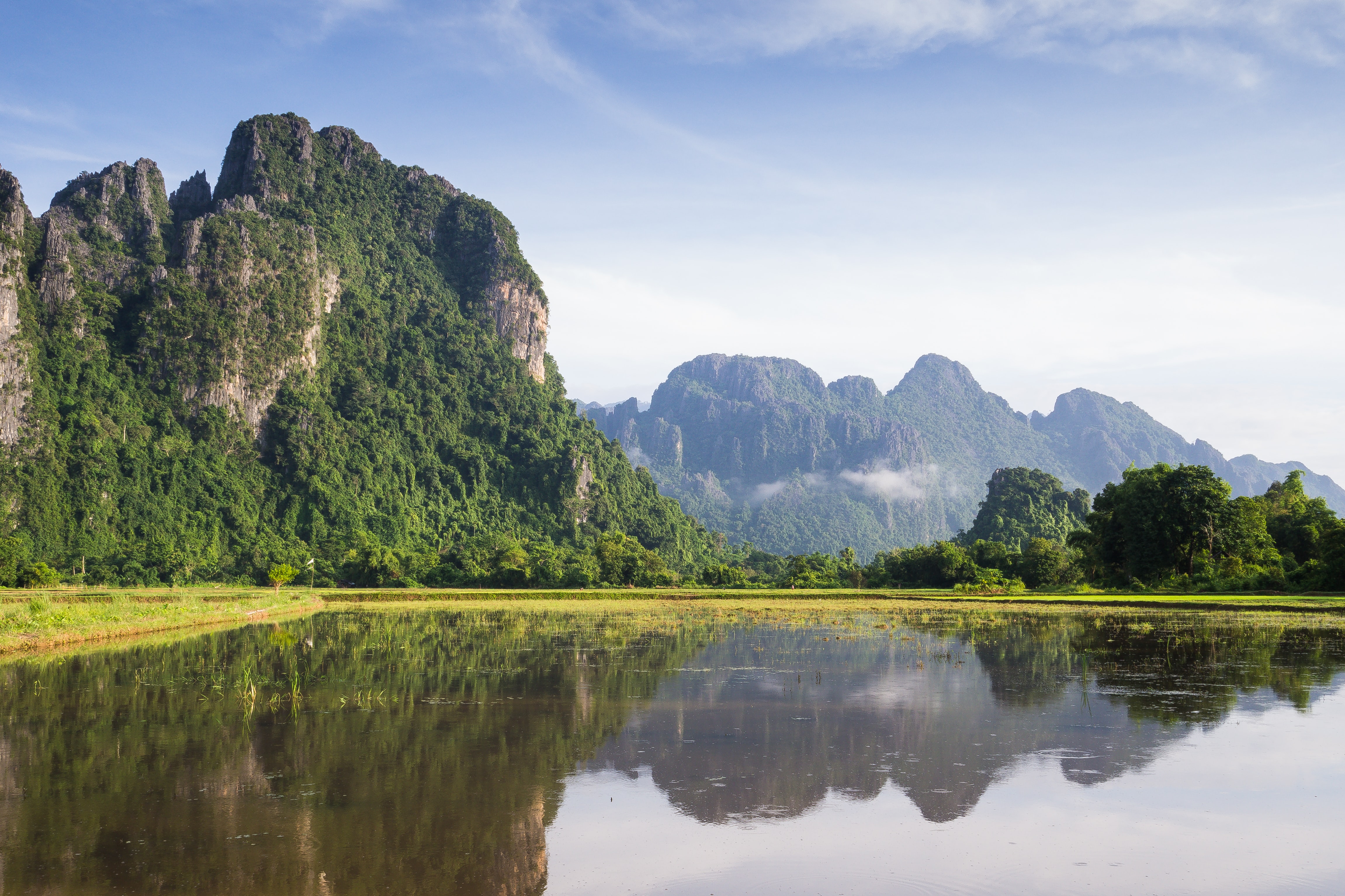 Vang_Vieng_Laos_bckfwd-r4l_VwRHDY4-unsplash.jpg Vang Vieng landscape