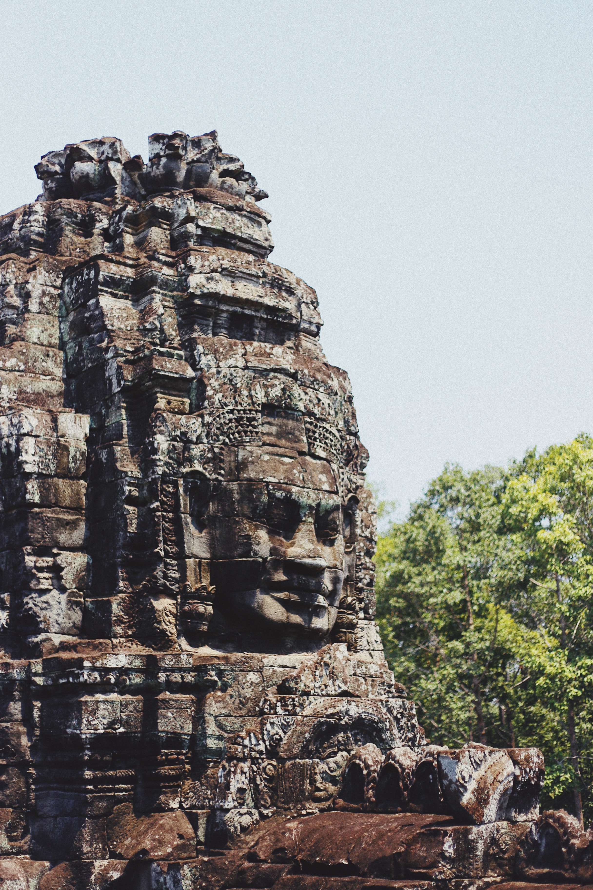 taylor-simpson-p6-9LcGDhHc-unsplash.jpg Temple face at Angkor Wat