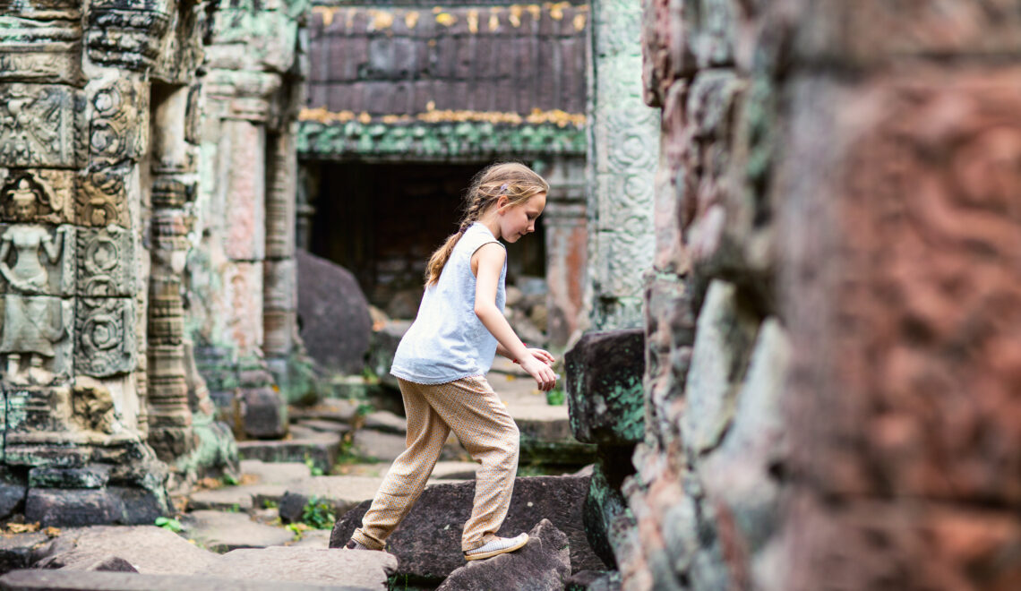 Cambodia-Siem Reap-Angkor_Thom_Scavenger_Hunt3.jpg Girl exploring Angkor Thom