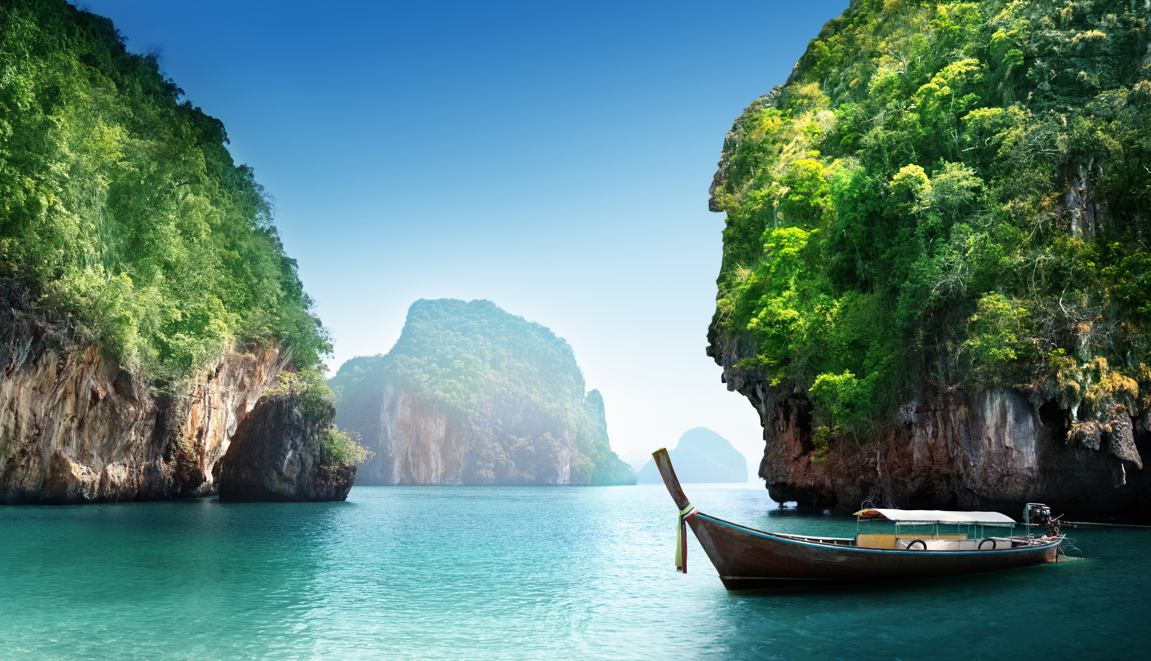 PLACE HERO - Krabi_iStock-508887139_IakovKalinin.jpg Boats at Krabi