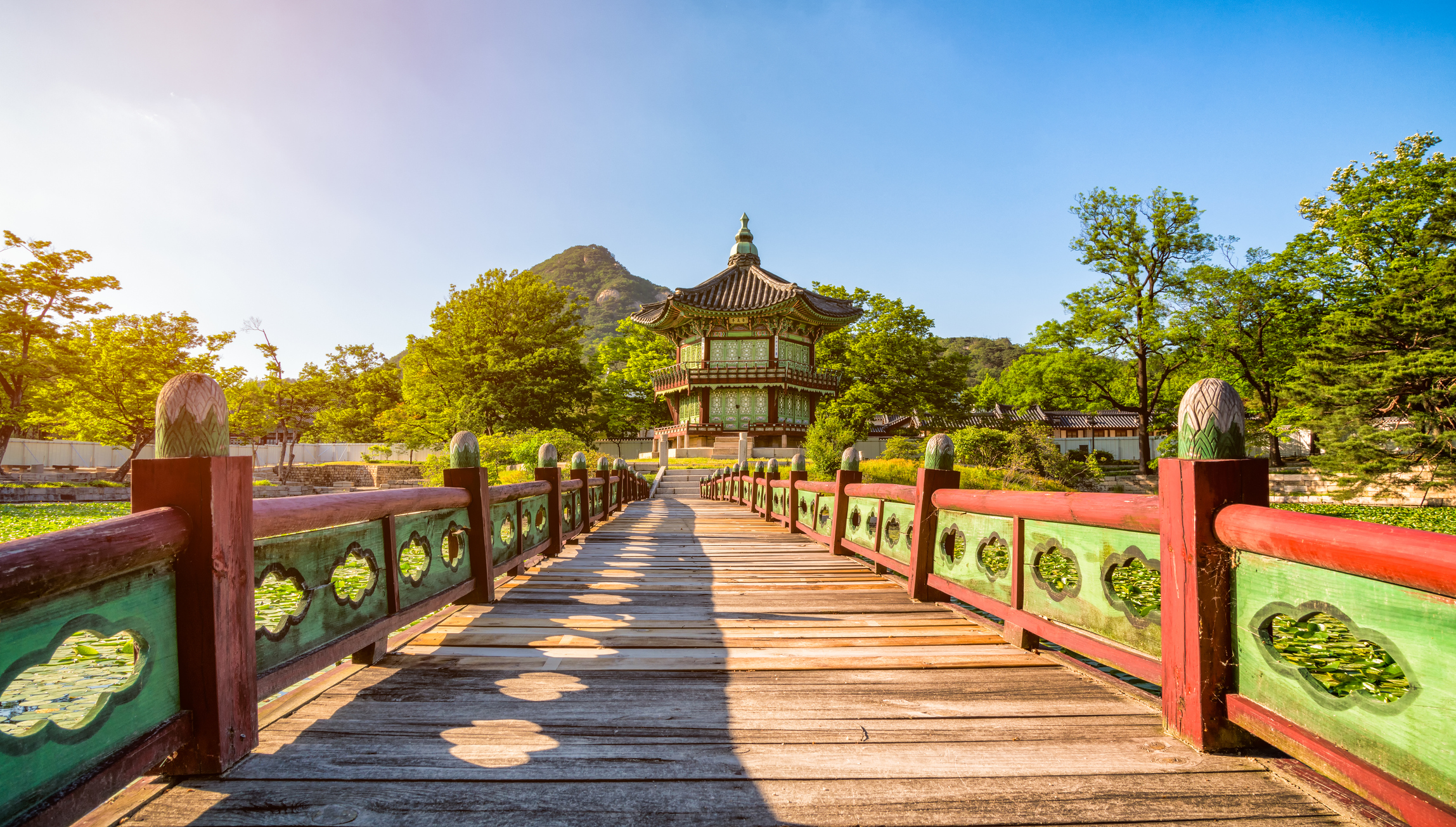 Bridge-Seoul.jpg Ornate bridge leading to small pagoda in park