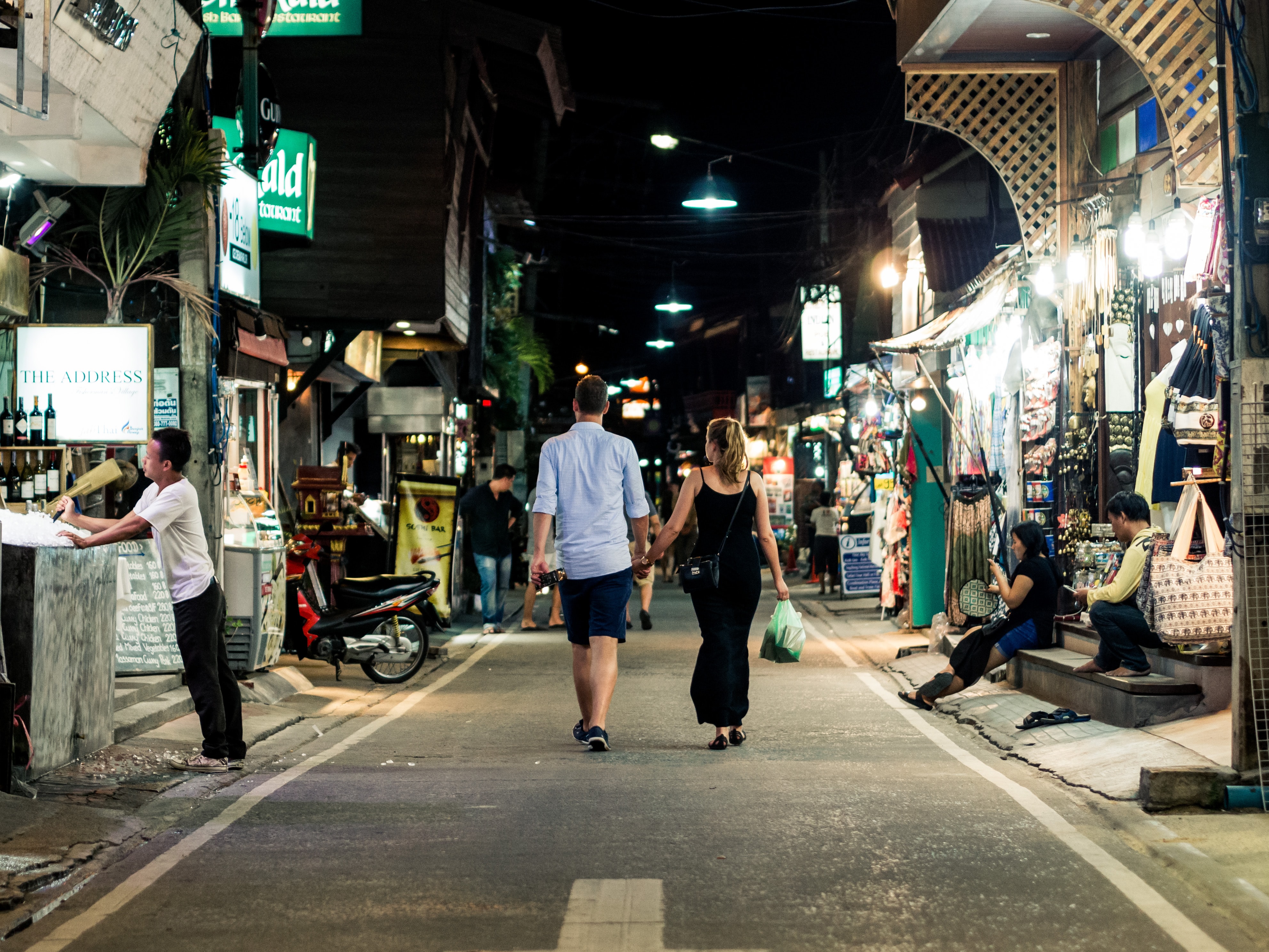 Couples-walking-Asia-market.jpg Couples walking through Asia market