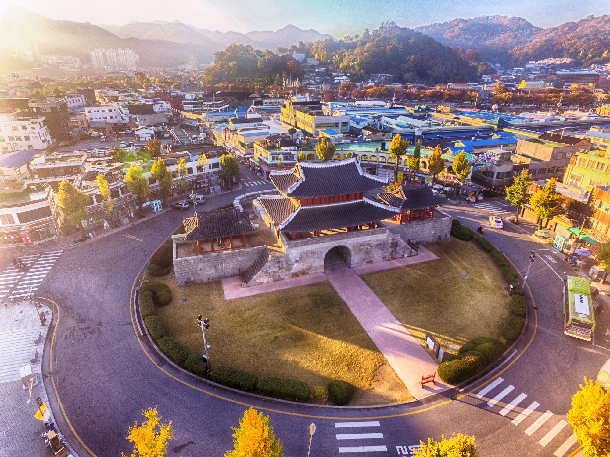 Jeonju-Hanok-Village.jpg Aerial view of ornate building in middle of roundabout