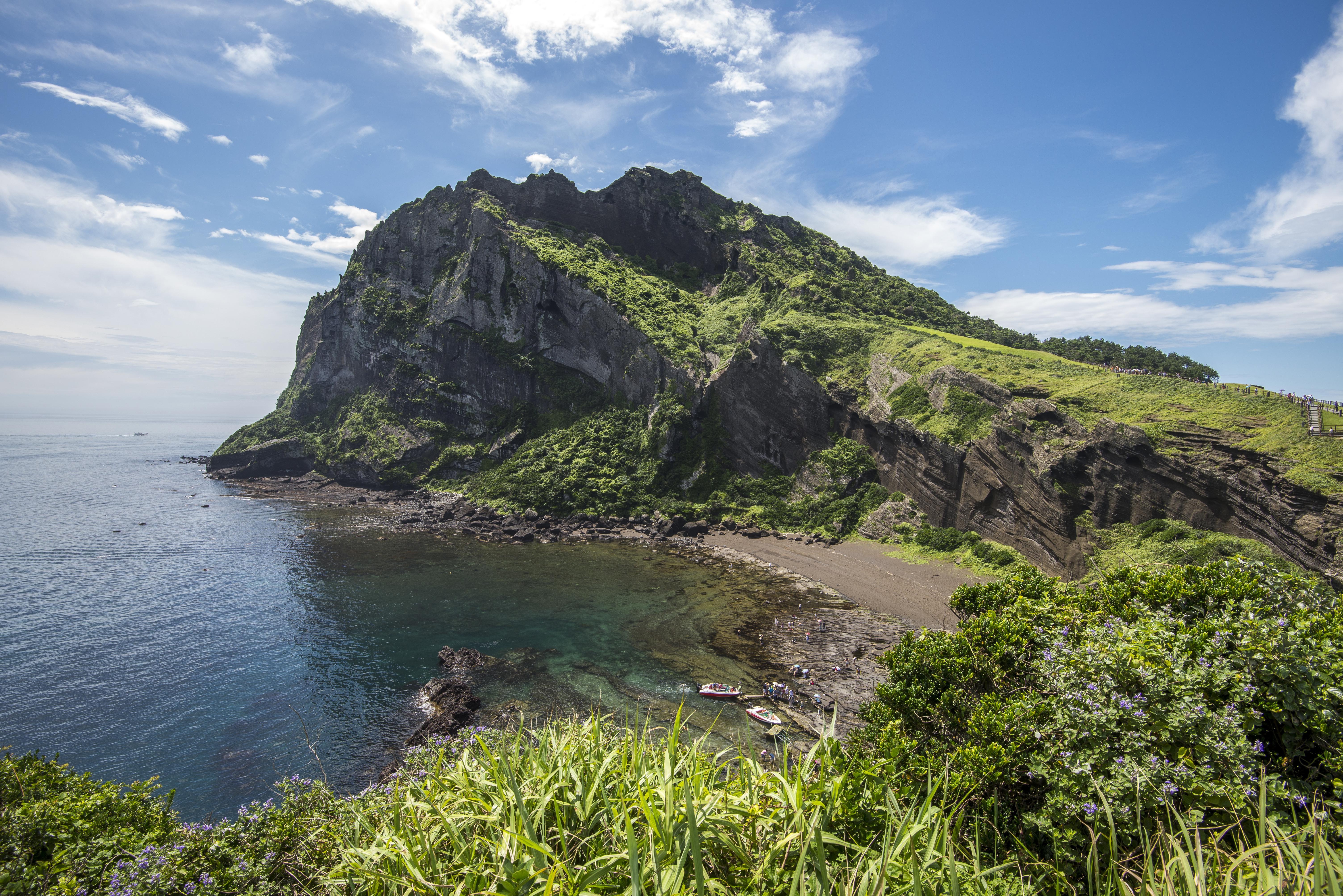SeongSan-Ilchulbong-Jeju-Island.jpg Rocky peninsula and cove on Jeju Island