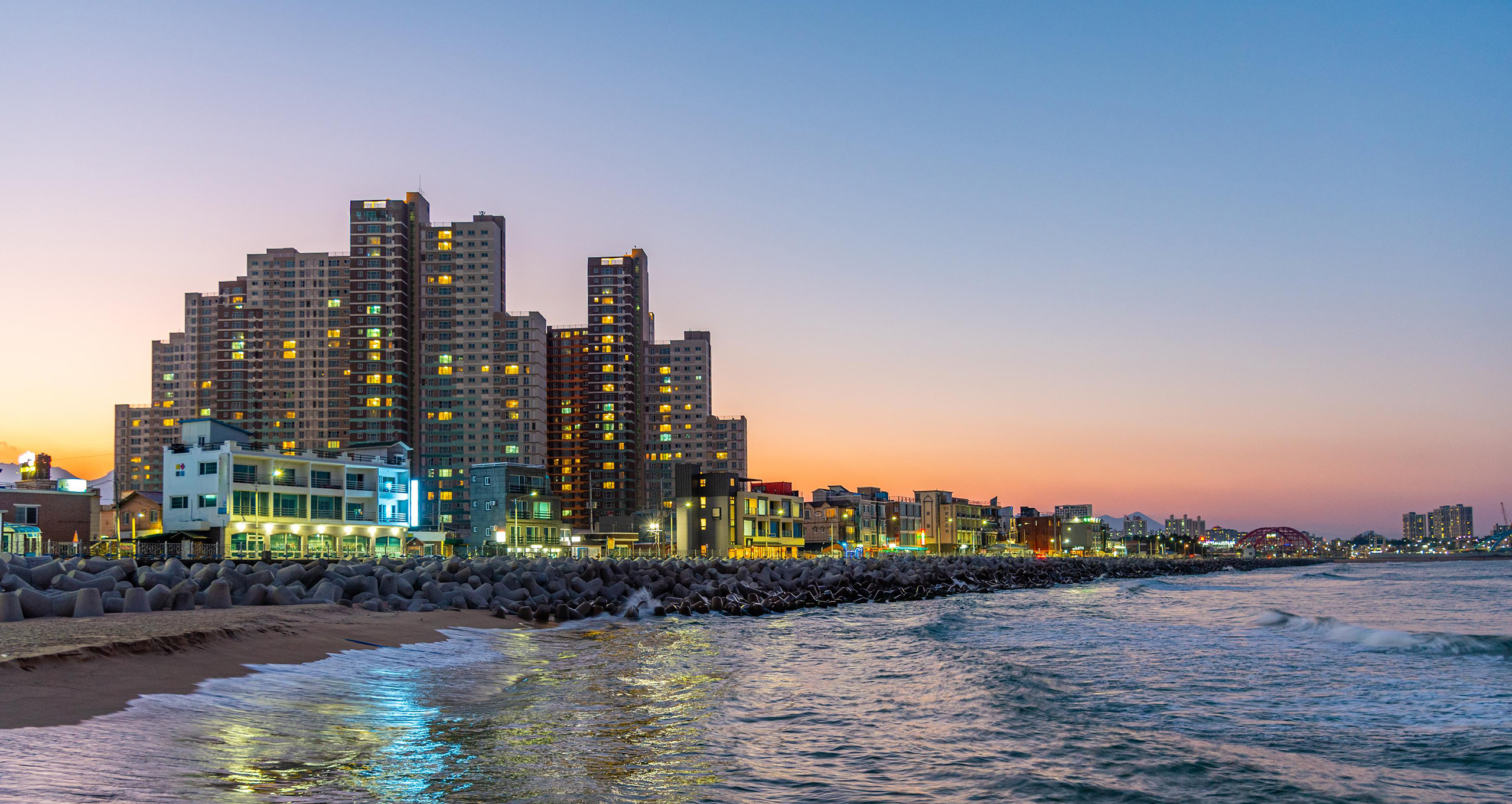 Skyline-of-Sokcho-behind-the-sea-korea.jpg Skyline of Sokcho behind the sea at sunset