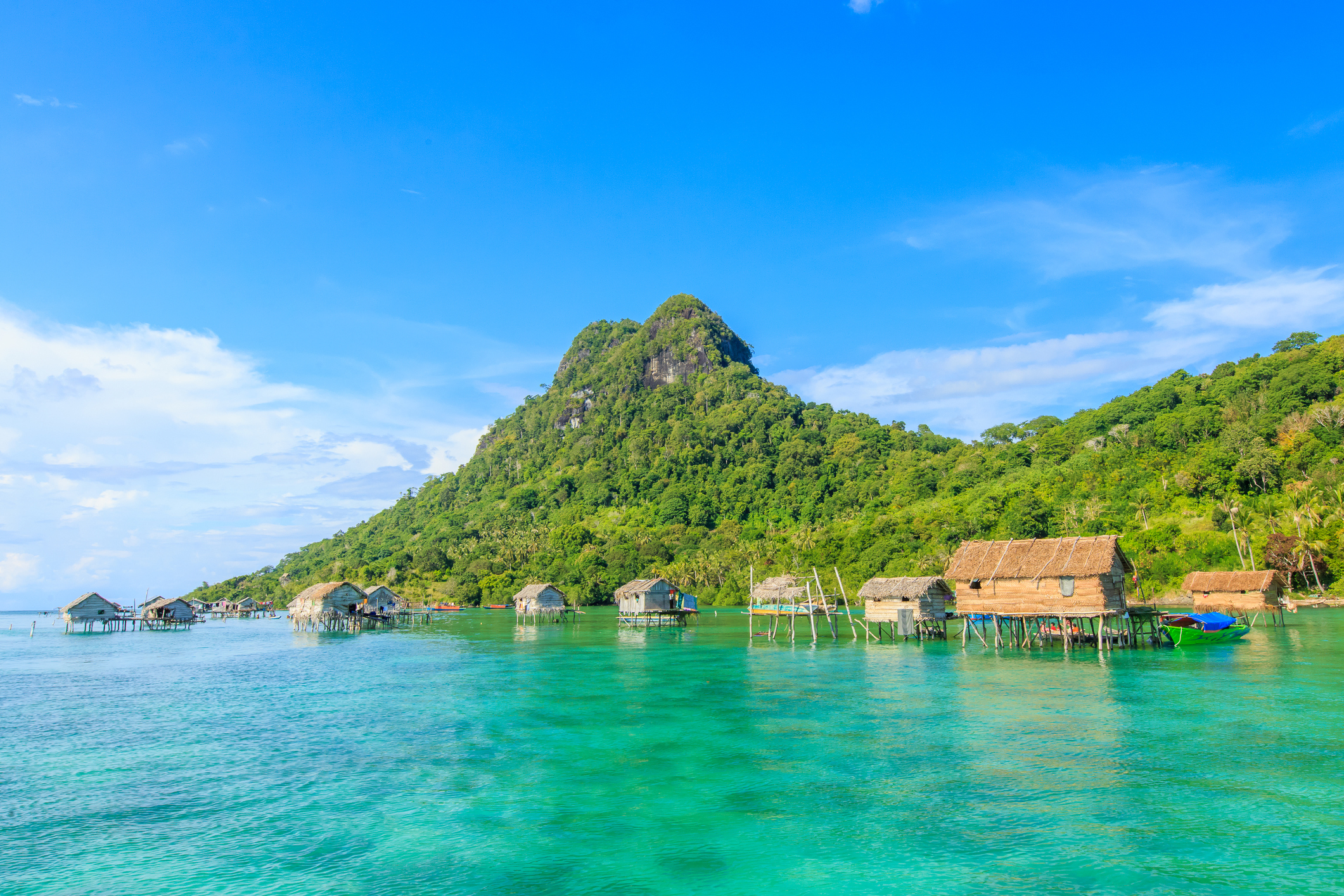 Mabul Bodgaya Island_iStock-925110842_yusnizam.jpg Wooden huts on stilts on Mabul Bodgaya Island, Malaysia
