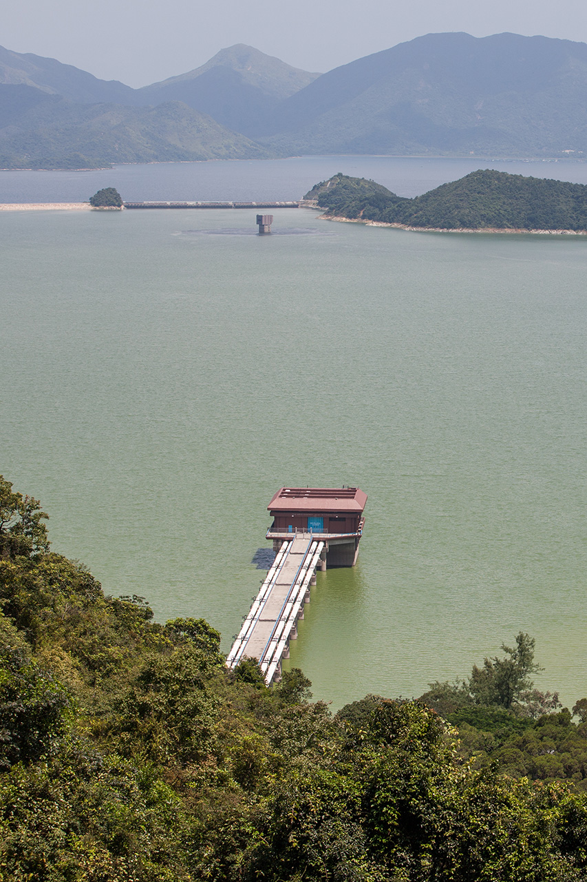 Plover Cove Reservoir seen from Tai Mei Tuk to Starling Inlet hike vertical.jpg Looking down on jetty into reservoir