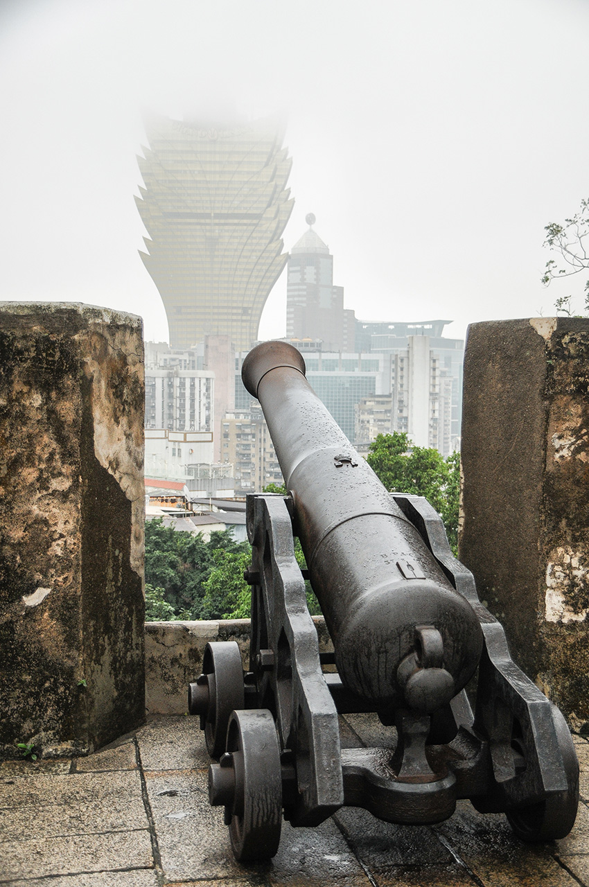 St Paul Cannon and Casino vertical.jpg Cannon pointing through wall on misty day