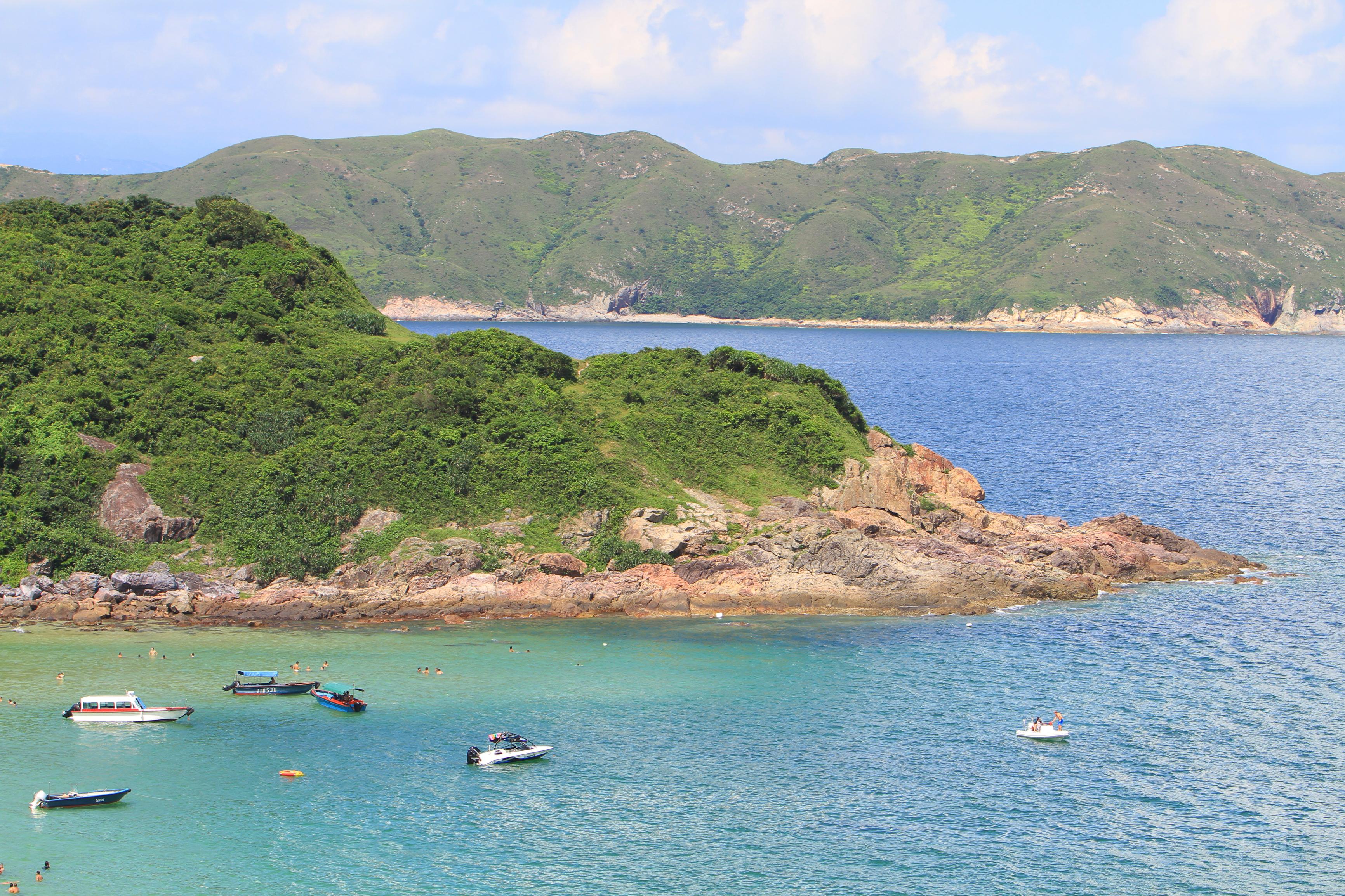 Sai-Kung-Country-Park.jpg Boats anchored up by secluded island in Sai Kung Country Park