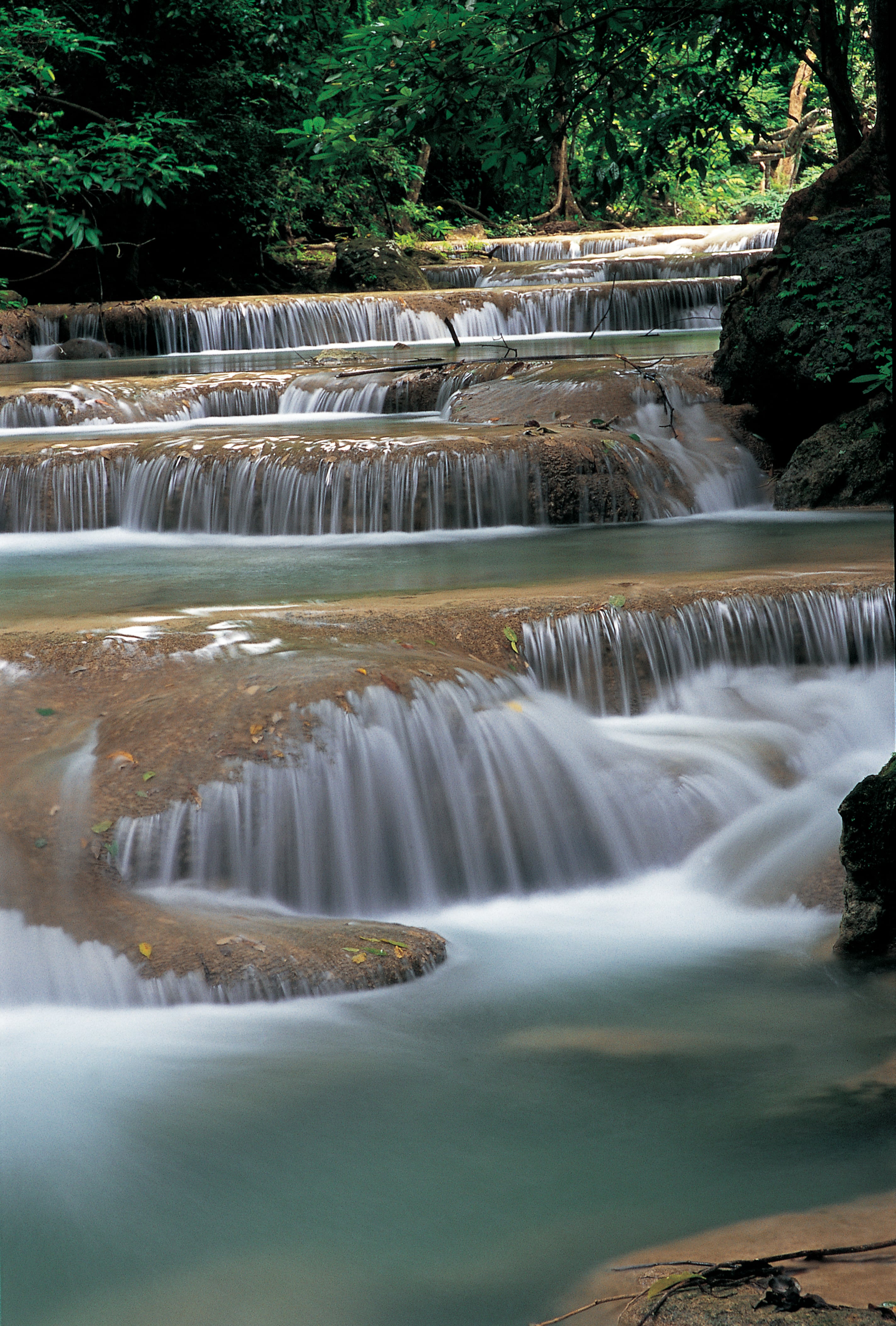 Thailand_Kanchanaburi_ErawanFalls.jpg Gently cascading waterfall in Kanchanaburi, Thailand