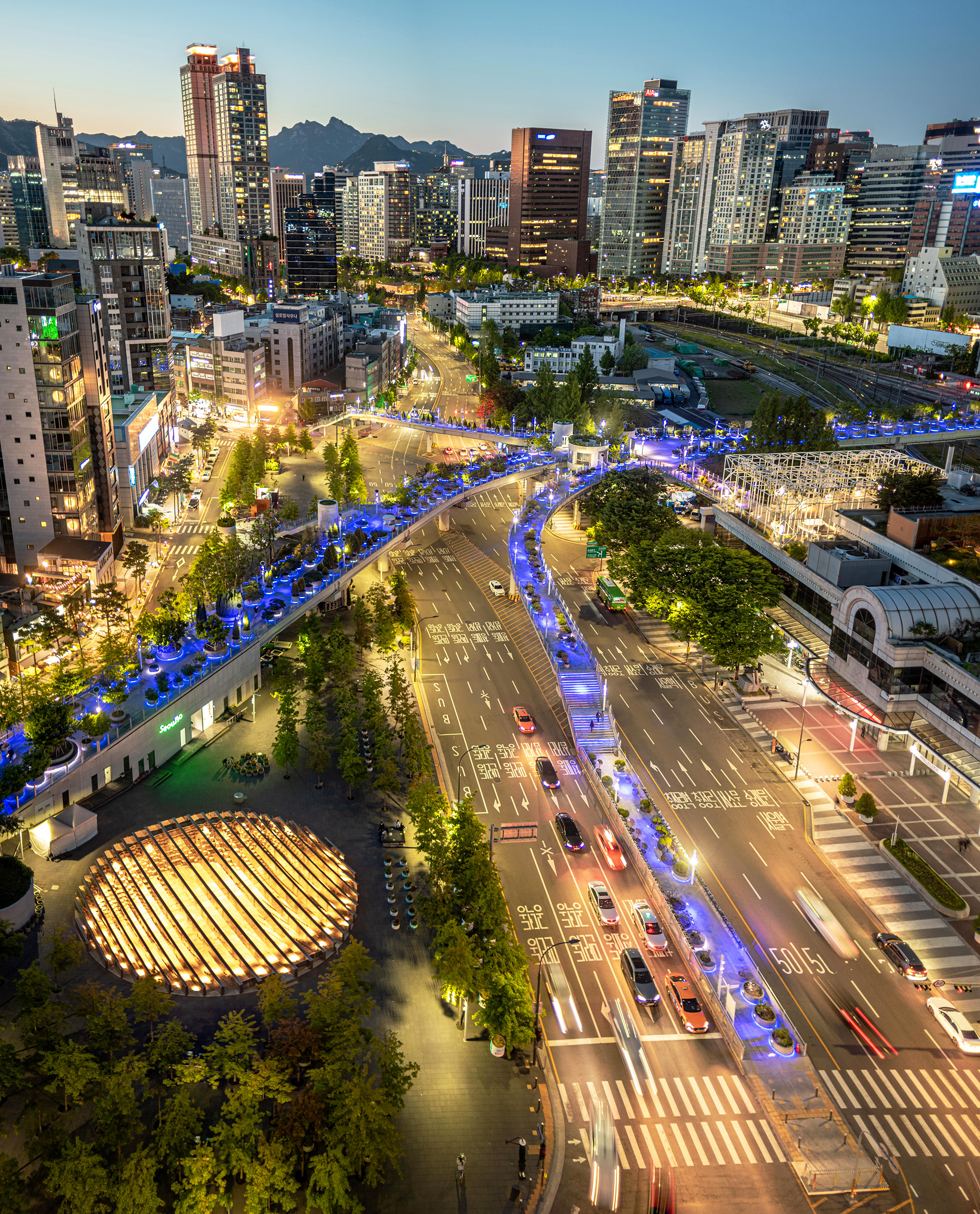 Gallery - ESK Downtown Seoul Nightscape Warm lights shine from urban Seoul at dusk in South Korea