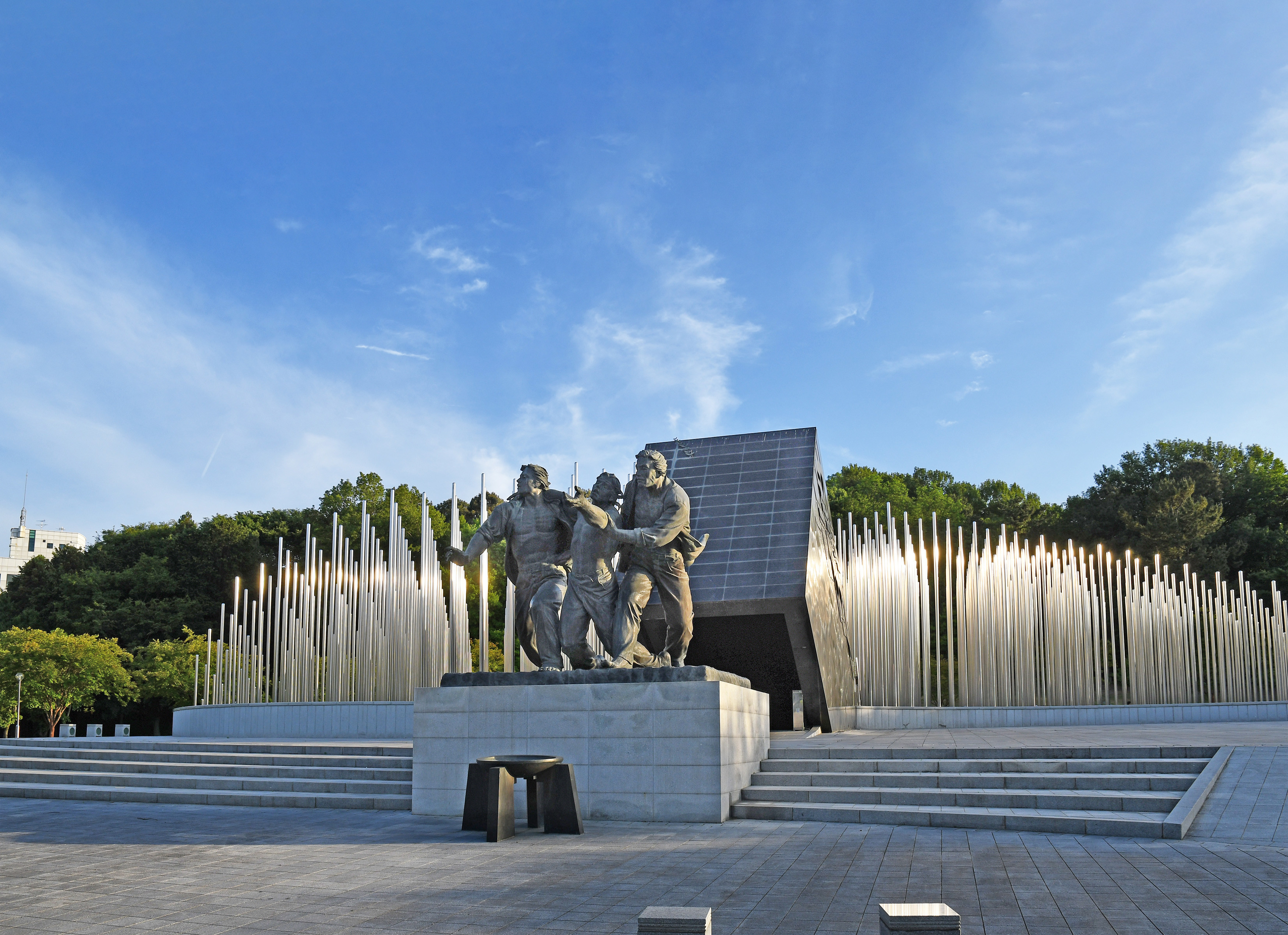 HERO Gwangju May 18 Memorial Park_b Three statues of men commemorate the democratic movement in May 18 Memorial Park in Gwangju, South Korea