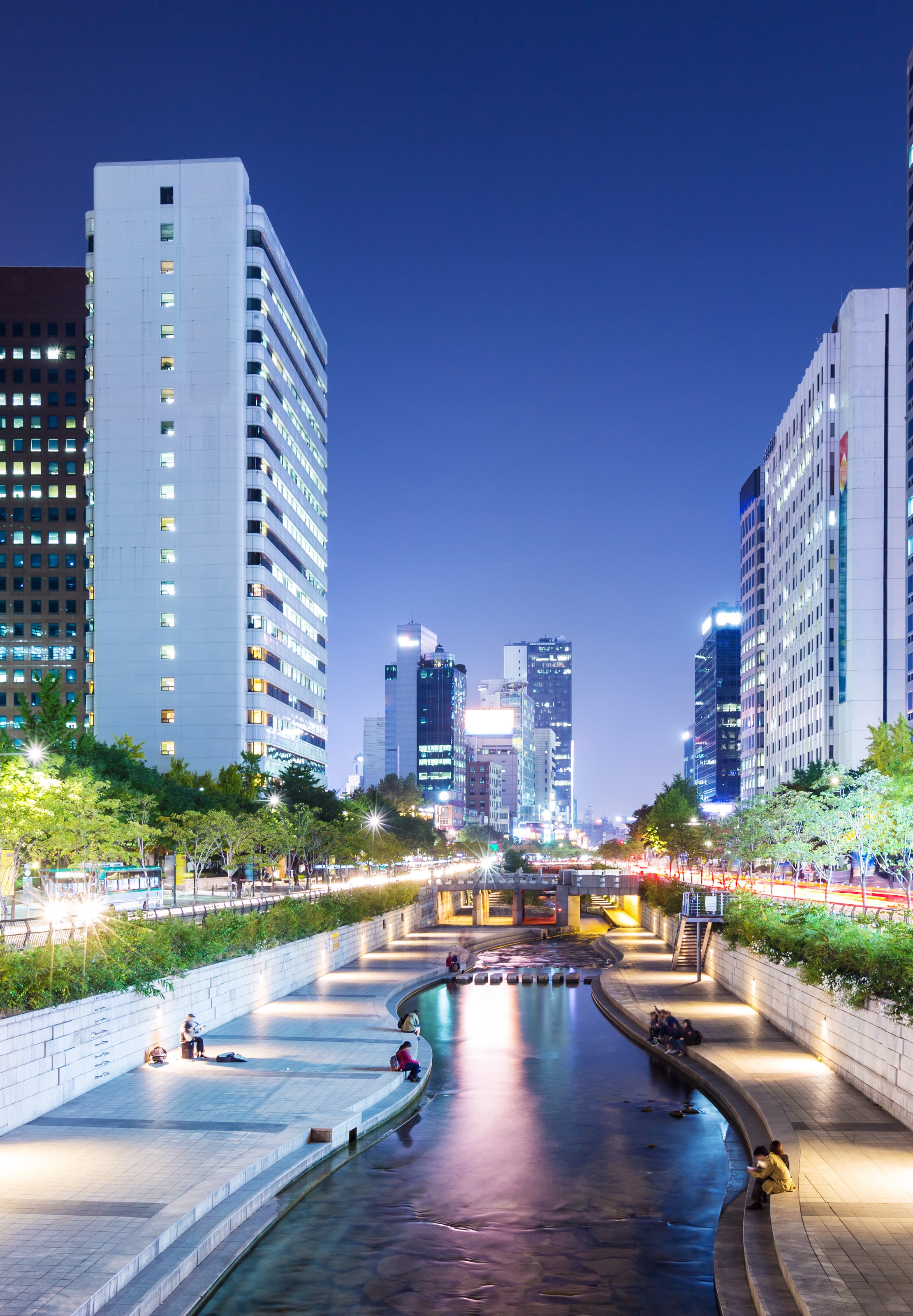 KW Days 1-4 Cheonggyeon Stream Cheonggyecheon stream in downtown Seoul at night with lights reflecting on the water