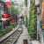 Walking along the railway tracks in the back streets of Hanoi