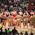 Sumo wrestlers standing in circle at sumo tournament