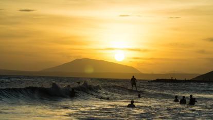 Surfing at sunset in Mui Ne