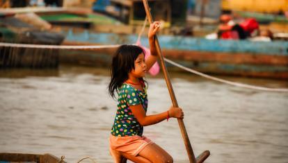 Girl on boat in Mekong Delta