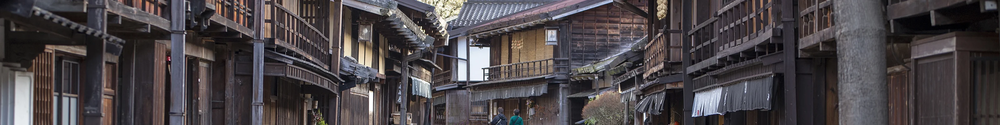 Wooden buildings lining street in Tsumago, Japan 
