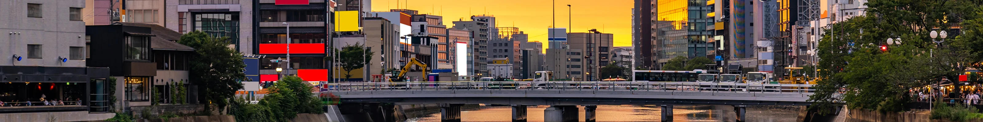 Sunset behind bridge over Naka River in Fukuoka, Japan