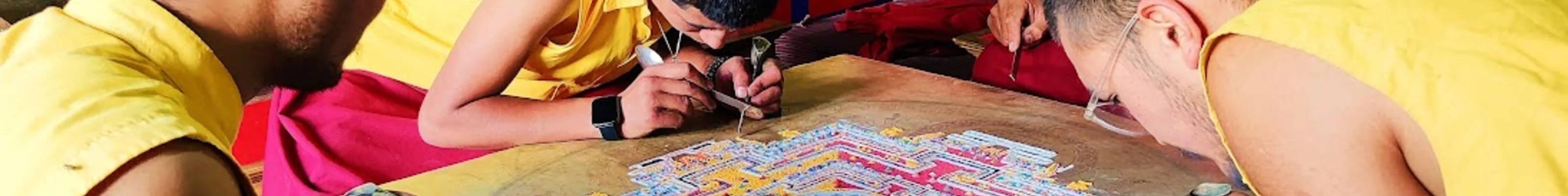 Tibetan monks doing traditional art