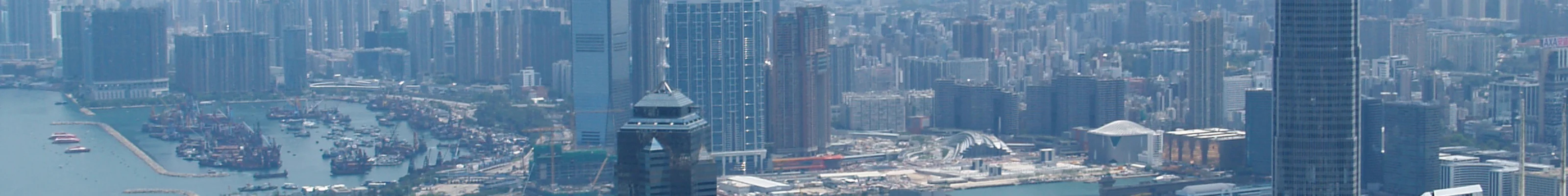 City skyline view of Hong Kong with hills in the background