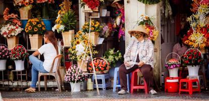 Vietnam woman at market wearing a face mask