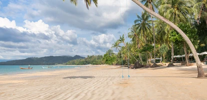Warm waters and beautiful beach in Khao Lak on a sunny day